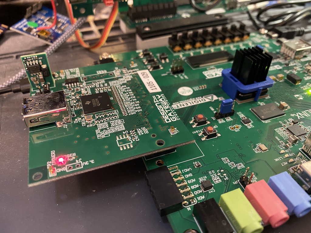 the USB3FMC carrier board is mounted atop another FPGA board